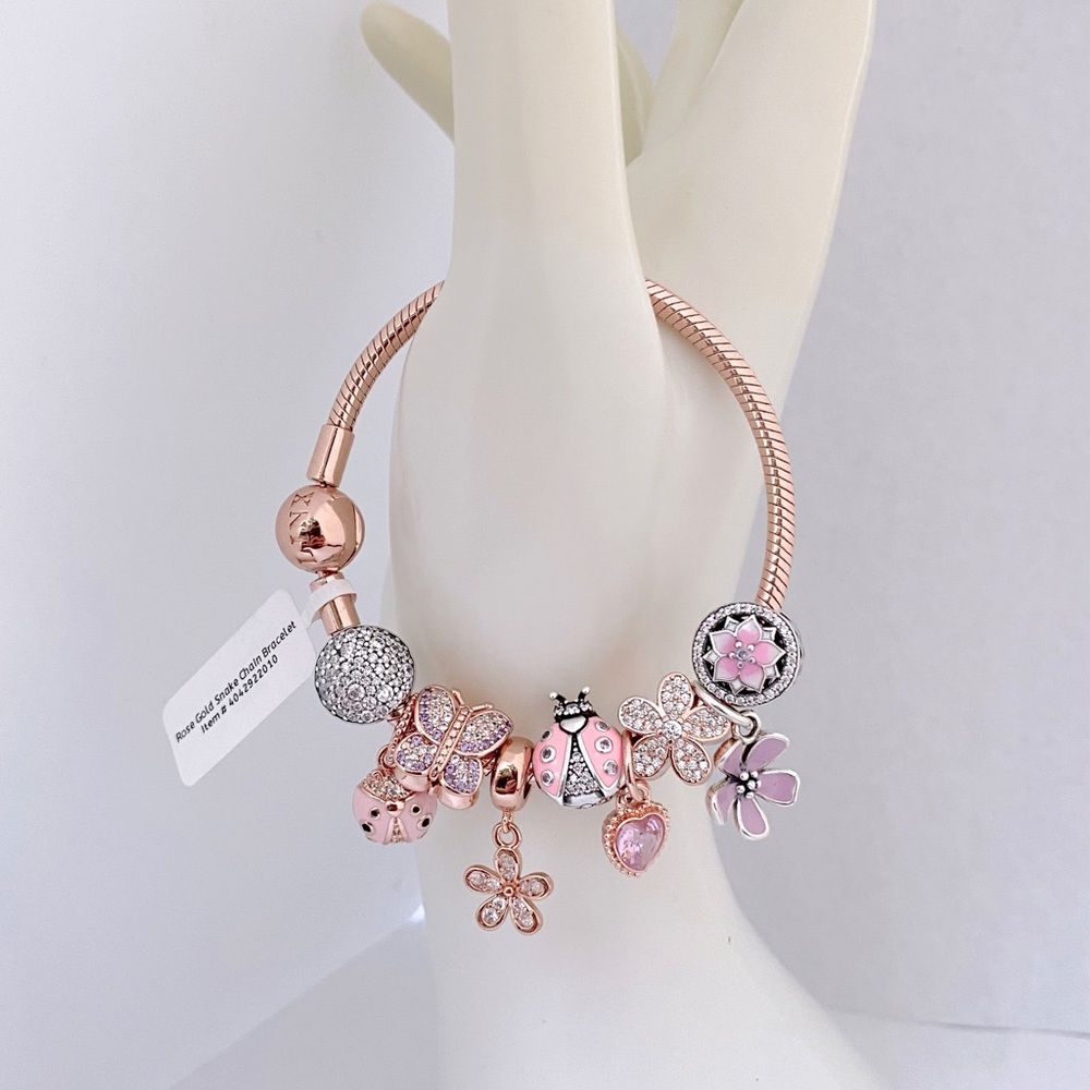 Linx Rose Gold Bracelet with Rose Gold Pink and Silver Themed Charms